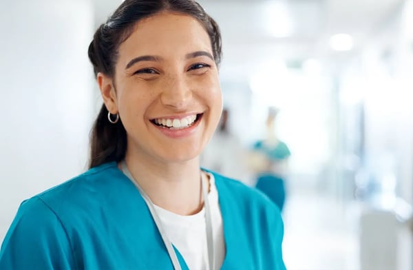 Happy young female nurse